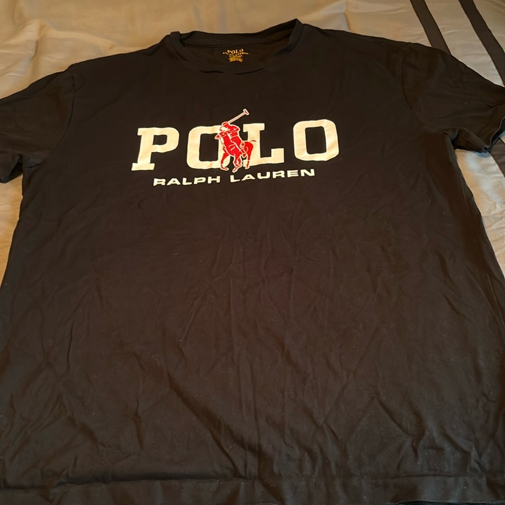 Never worn! Navy Polo Tshirt is all but new!